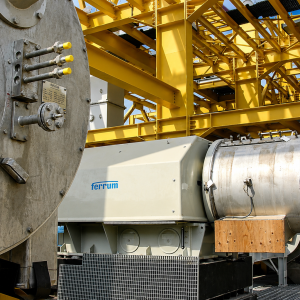 Industrial Ferrum Machinery Under Yellow Gantries